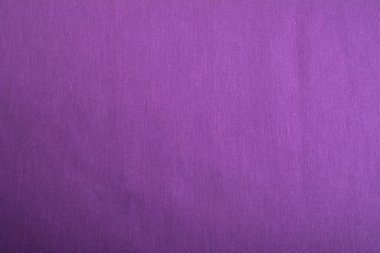 Mor Pamuk doğal kumaş ön görünümü, tasarım çalışmaları için arka plan olarak kullanılabilir. Ön manzara. Elbise ve gömlek dikmek için. Metin için boşluk.