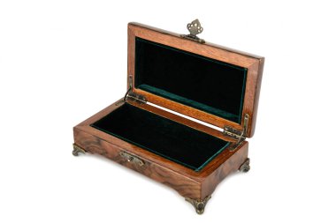 Open wooden jewelry box with velvet lining
