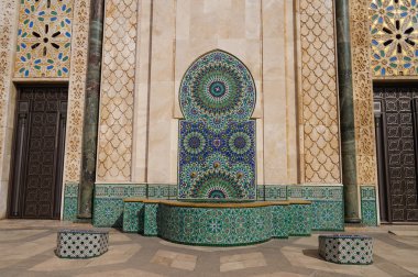 Decorated fountain of Hassan II mosque in Casablanca clipart