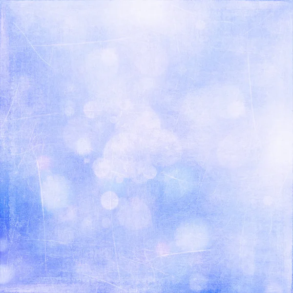 Bianco bokeh su luminoso blu grungy sfondo — Foto Stock