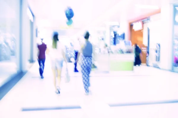 Gente de compras de la ciudad multitud en el mercado fondo abstracto —  Fotos de Stock