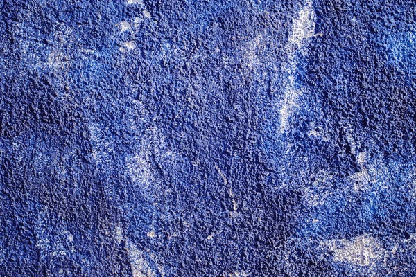 Sfondo o texture della parete di vernice blu granello — Foto Stock