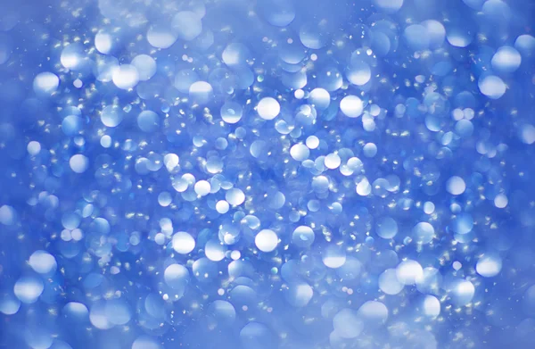 Abstract blue glitter background. Shiny glitter bokeh christmas — Stockfoto