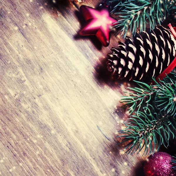 Christmas decorations on wood — Stock Photo, Image