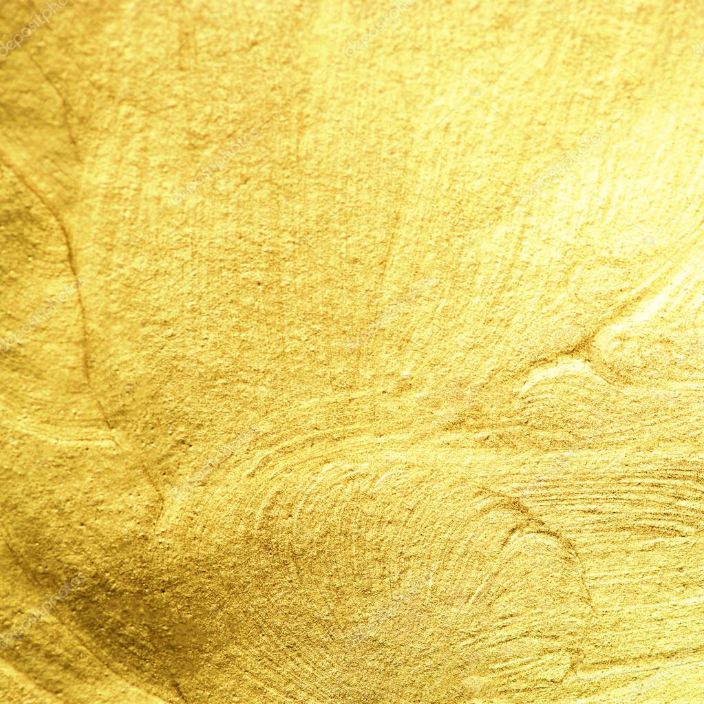 Golden foil as abstract background. — Stock Photo © Zakharova 113490366