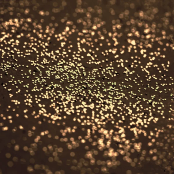 Donker goud glitter. Abstracte kerst twinkled magische achtergrond — Stockfoto