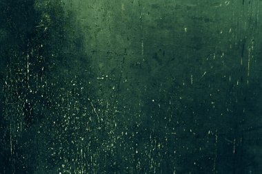 Eski yeşil renkli Grunge arka plan / Koyu dokulu duvar closeup