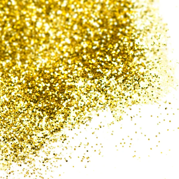 Gold sparkles isolated  on white