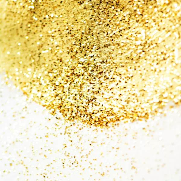 Glittering gold background over white — Stock Photo, Image