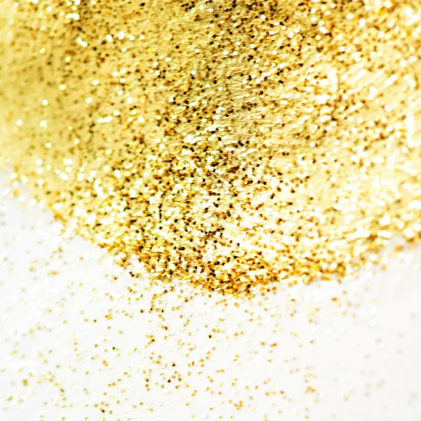 Glittering gold background over white