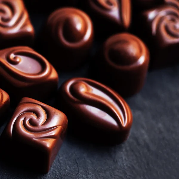 Chocolate over black background — Stock Photo, Image