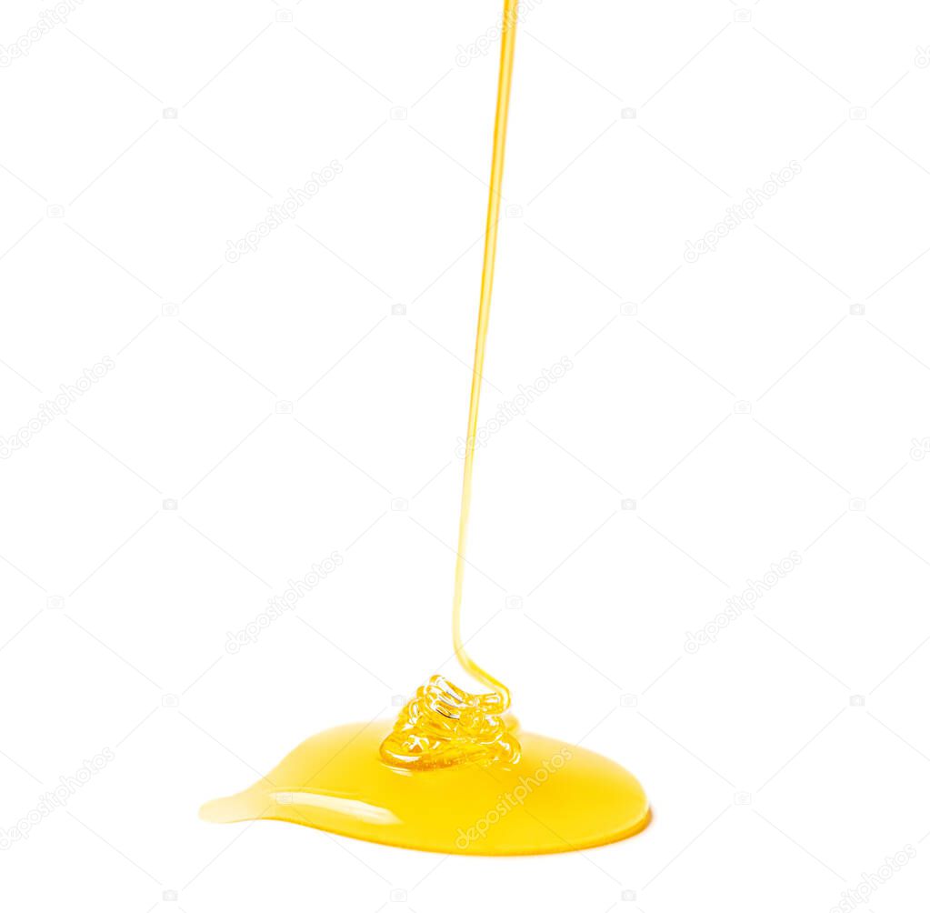 Flowing Honey isolated  on white background. Organic natural ingredients concept