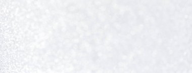 Yılbaşı ışıltılı Gümüş Arkaplan. Noel ışıkları. Bir tebrik kartı olarak bulanık Xmas Bokeh