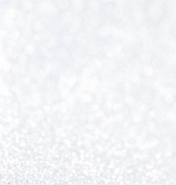 Parlayan Gümüş Arkaplan Noel 'i. Noel ışıkları. Bir tebrik kartı olarak bulanık Xmas Bokeh