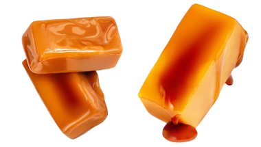 Karamel soslu tatlı karamel şekerler beyaz arka planda izole edilmiş. Koleksiyon. 