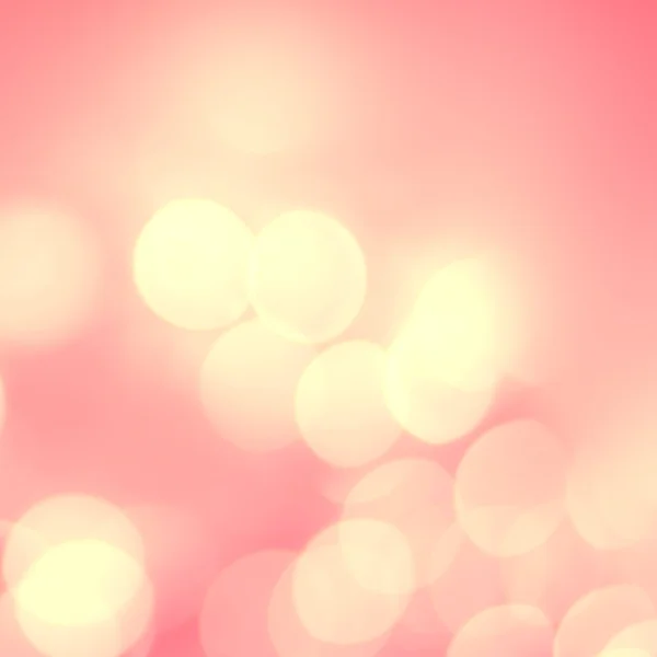 Růžové a zlaté holiday bokeh — Stock fotografie