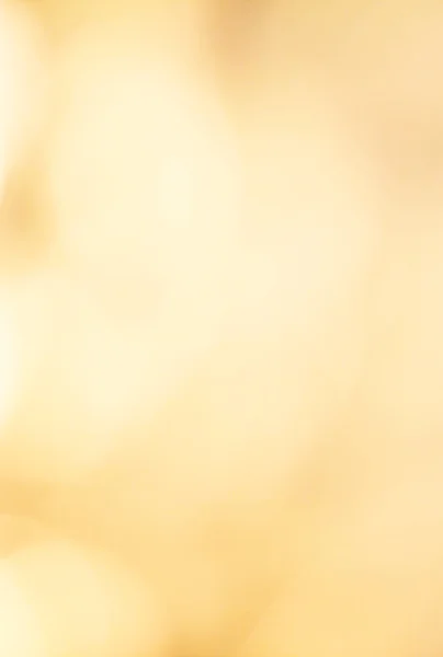 キラキラと黄金色の defocussed ライトの背景. — ストック写真