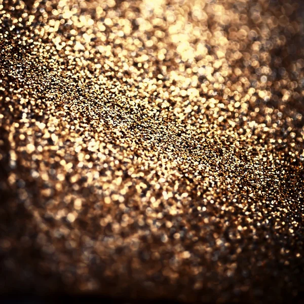 Фон з блимаючими вогнями і золотою дефокусованою текстурою — стокове фото