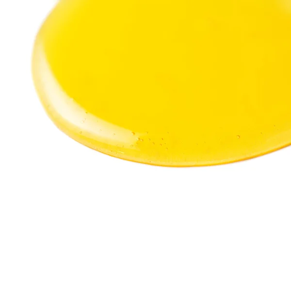 Mel amarelo que flui gota líquida — Fotografia de Stock