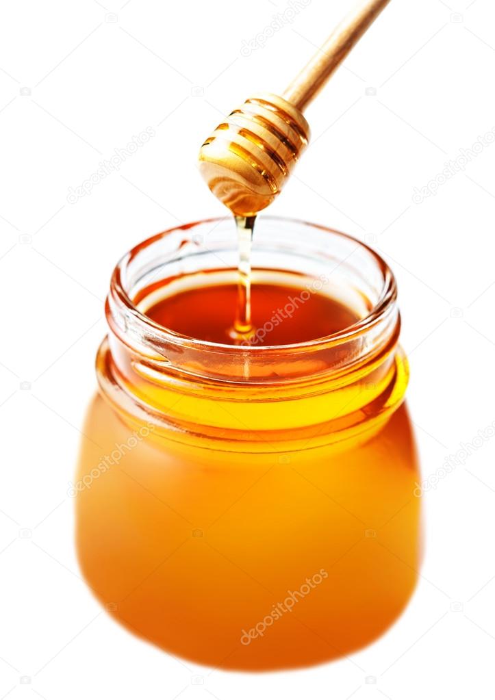 Honey in a glass jar with honey dipper Stock Photo by ©Zakharova 77630891