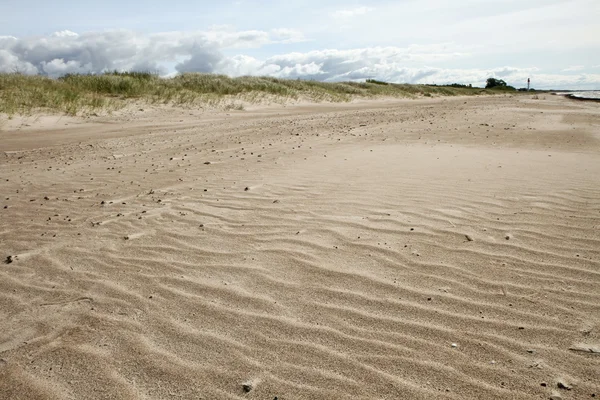 Zand in de buurt van de zee — Stockfoto