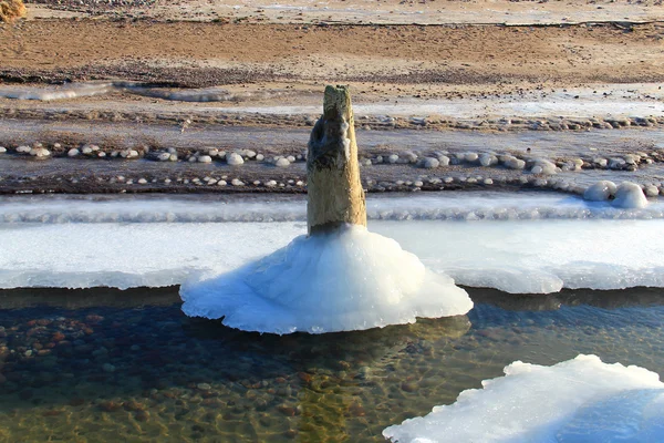 Pile in ice — Stock Photo, Image