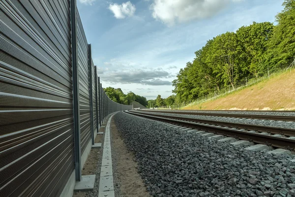 Järnvägsspår som leder in avståndet — Stockfoto