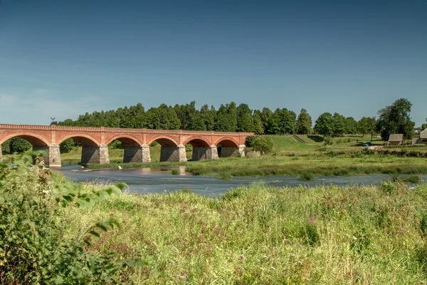 The bridge over the river in Latvia — Stock Photo, Image