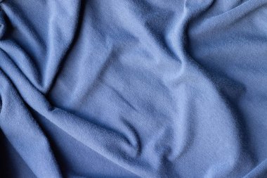 Pamuk forma kumaş dokusu. Buruşmuş mavi tekstil arkaplanı