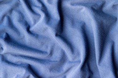 Pamuk forma kumaş dokusu. Buruşmuş mavi tekstil arkaplanı
