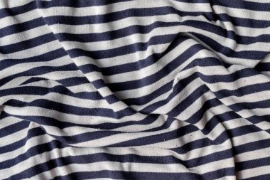 Pamuk forma çizgili kumaş ve hap dokusu. Buruşuk mavi ve beyaz tekstil arkaplanı