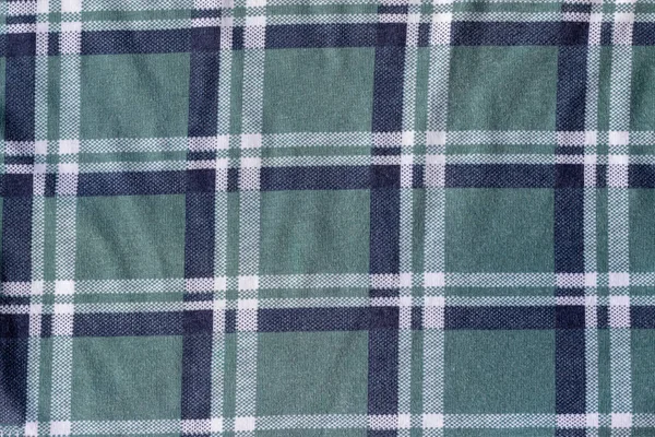 Bawełniana koszulka, tkanina w kratę. Zielony niebieski biały tło włókiennicze — Zdjęcie stockowe