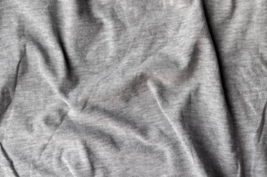 Pamuk forma kumaş dokusu. Buruşmuş gri tekstil arkaplanı