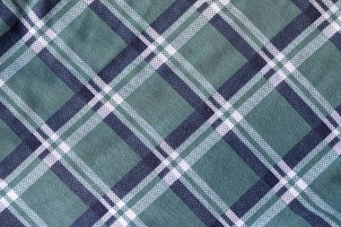 Pamuk forma, ekose kumaş, kumaş dokusunu kontrol ettim. Yeşil mavi beyaz tekstil arkaplanı