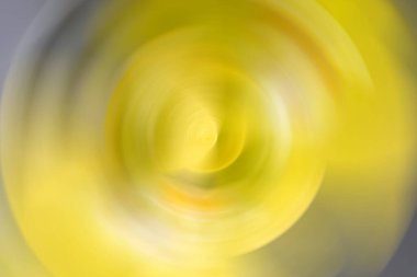 Bulanık sarı eğim, radyal hareket arkaplanı. Soyut dairesel doku