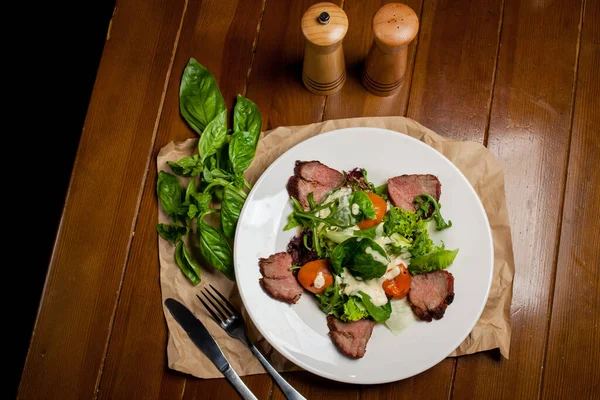 Meat Beef Steaks Greens Apricots Sauce Large White Plate Food — Stock Photo, Image