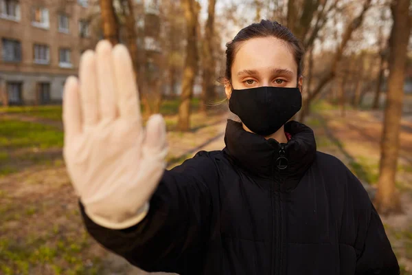 Girl Black Jacket Black Medical Mask Shows Her Hand Stop — Stock Photo, Image