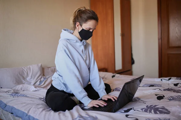 Caucasian Girl Blue Hoodie Black Mask Works Laptop Home Isolated — Stock Photo, Image