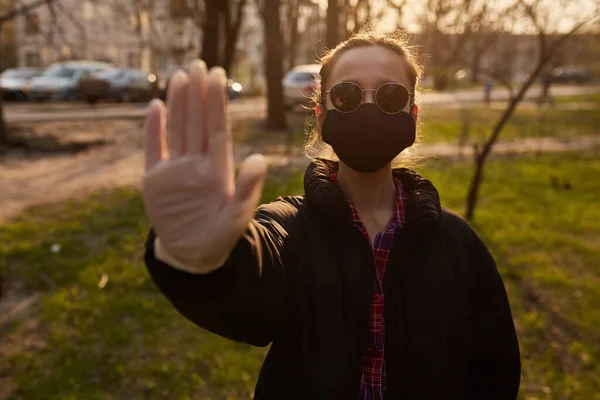 Girl Black Jacket Glasses Black Medical Mask Shows Stop Sign — Stock Photo, Image