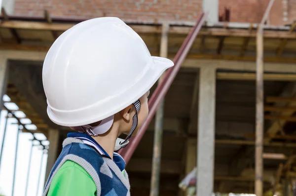 Boy pretending to be a construction worker — Stock Photo, Image