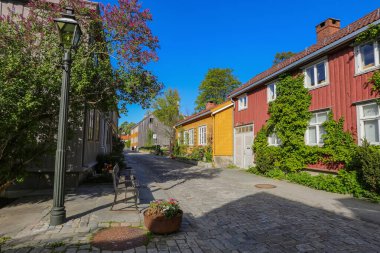 the street in Bakklandet, popular touristic district in Norwegian city Trondheim 