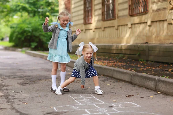 Cheerful children's games in the yard. Children's summer holidays. Soviet childhood . USSR