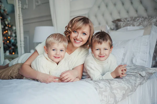 Beautiful Mother White Knitted Dress Her Sons White Sweaters Sitting — Stock Photo, Image