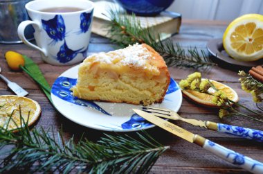 Apple pie with vintage knife and fork painted  blue flowers