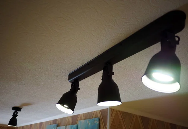 Ceiling lamp with soffits of gray color