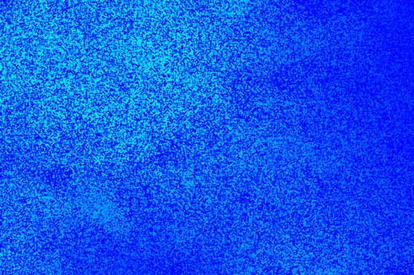 Bewegung glänzender Pixel - schimmernder königsblauer Staub. Stockbild