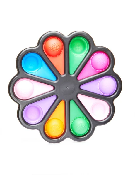 Juguetes sensoriales coloridos del antiestrés de la burbuja del pop-push en forma de flor, aislados en fondo blanco — Foto de Stock
