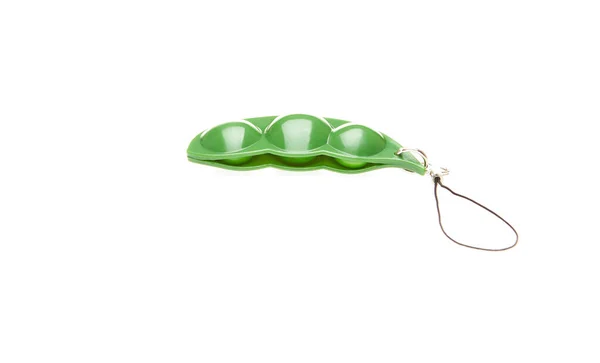 Keychain brinquedo em forma de vagem de ervilha, isolado no fundo branco — Fotografia de Stock
