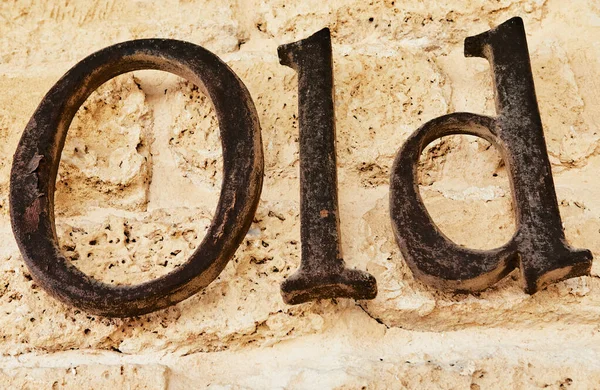 Word Old Metal Letters Stone Background — Stock fotografie