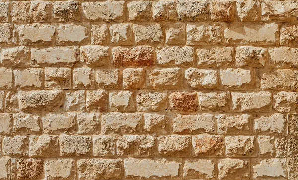 Hintergrund der Steinmauer der Burg aus Steinen unterschiedlicher Formen und Größen und Strukturen — Stockfoto